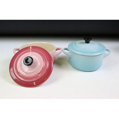 42 - Le Creuset cerise grand teapot, together with four coloured miniature twin handled lidded dish. Teap... 