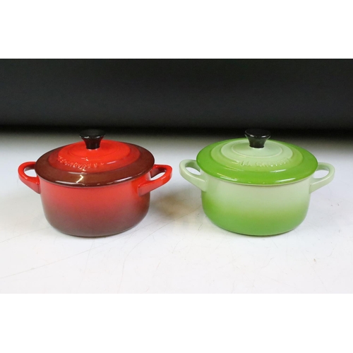 42 - Le Creuset cerise grand teapot, together with four coloured miniature twin handled lidded dish. Teap... 