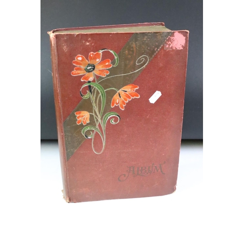 441 - Early 20th century postcard album, containing mostly early 20th century black & white and colour pos... 