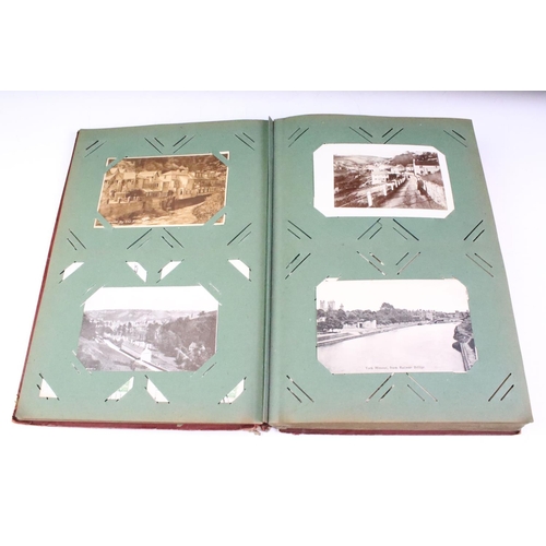 441 - Early 20th century postcard album, containing mostly early 20th century black & white and colour pos... 