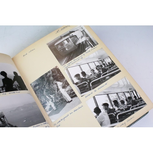 444 - Two Mid 20th century photograph albums to include a Hong Kong and Singapore example, containing blac... 