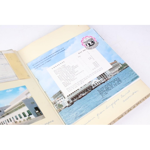 444 - Two Mid 20th century photograph albums to include a Hong Kong and Singapore example, containing blac... 