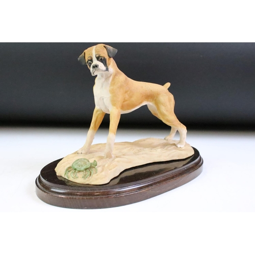 63 - Three resin boxer figurines to include Border Fine Arts, Leonardo Collection and Heritage. Tallest m... 