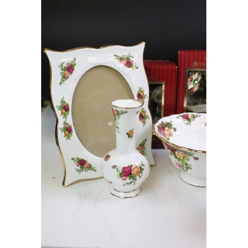 22 - Group of Royal Albert Old Country Roses ceramics to include four photo frames and spill vases, toget... 