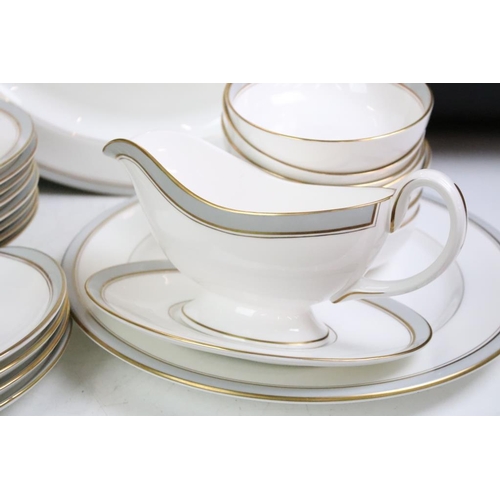 23 - Royal Worcester 'Howard' pattern part dinner service to include 11 dinner plates, 2 serving dishes, ... 