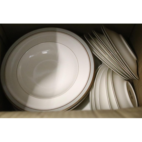 23 - Royal Worcester 'Howard' pattern part dinner service to include 11 dinner plates, 2 serving dishes, ... 