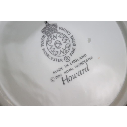 23 - Royal Worcester 'Howard' pattern part dinner service to include 11 dinner plates, 2 serving dishes, ... 