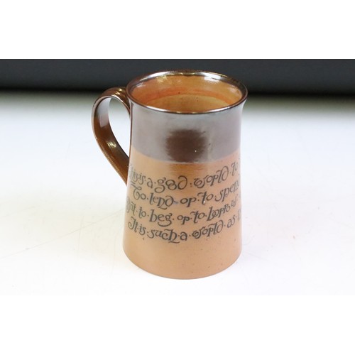 28 - Doulton Lambeth Salt-glazed Stoneware Tankard with a motto ‘  This is a good world to live in ……’ im... 