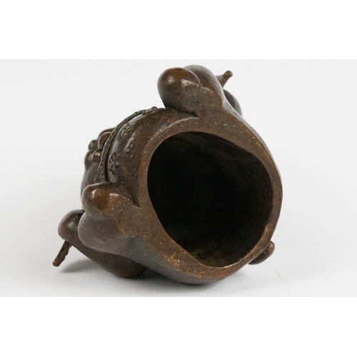 217 - An ornamental Japanese bronze 招き猫 / maneki-neko (waving / beckoning) lucky cat talisman.