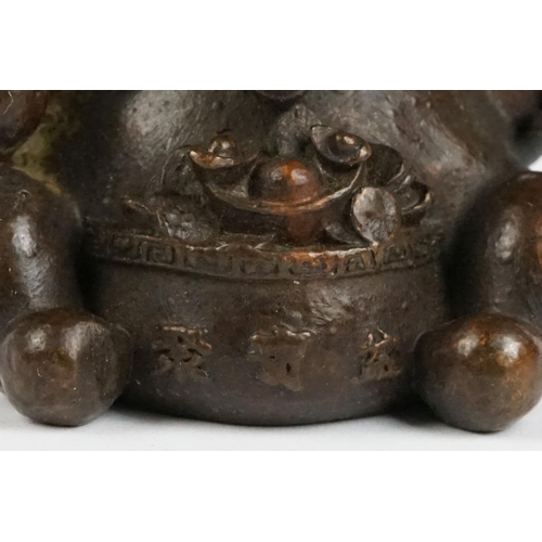 217 - An ornamental Japanese bronze 招き猫 / maneki-neko (waving / beckoning) lucky cat talisman.