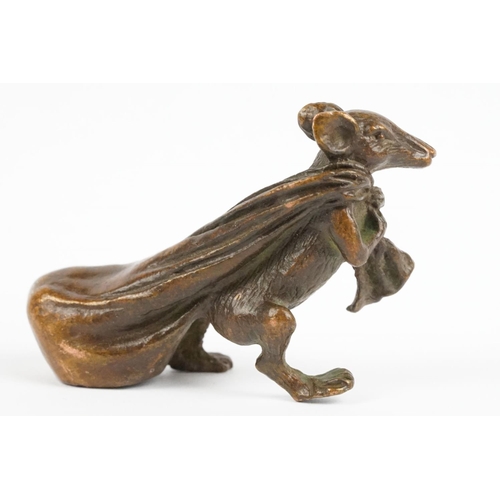 219 - An ornamental Solid bronze lucky fortune rat with bag.