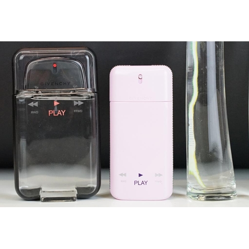 321 - A collection of perfume and scent dummy display bottles to include Yves Saint Laurent, Prada, Jean P... 