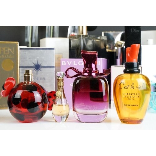 321 - A collection of perfume and scent dummy display bottles to include Yves Saint Laurent, Prada, Jean P... 