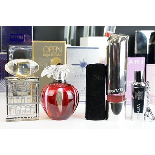 321 - A collection of perfume and scent dummy display bottles to include Yves Saint Laurent, Prada, Jean P... 