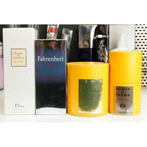 321 - A collection of perfume and scent dummy display bottles to include Yves Saint Laurent, Prada, Jean P... 