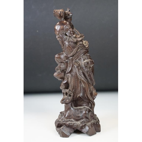 361 - Chinese carved hardwood figure depicting Shou Lau with a crane and deer to the naturalistic base. Me... 