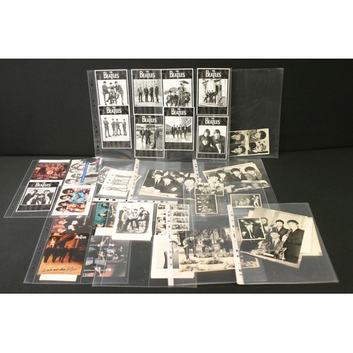 925 - Memorabilia - Portfolio of Beatles photographs from their early years, mostly black and white, postc... 