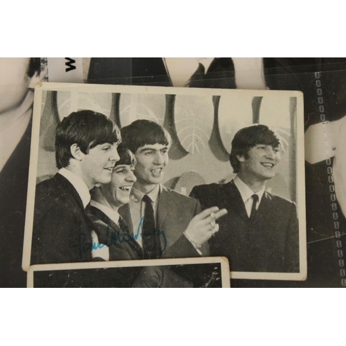 925 - Memorabilia - Portfolio of Beatles photographs from their early years, mostly black and white, postc... 