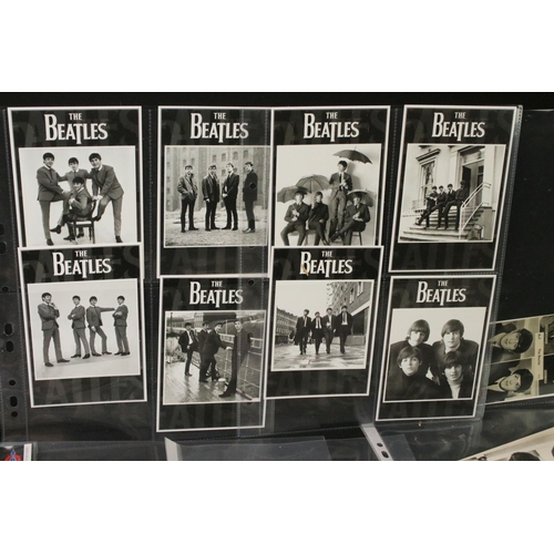 925 - Memorabilia - Portfolio of Beatles photographs from their early years, mostly black and white, postc... 