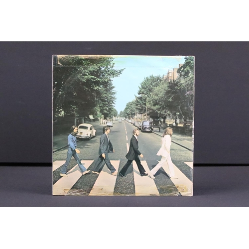 617 - Vinyl - 3 copies of The Beatles Abbey Road including one with misaligned apple with black inner (Vg+... 