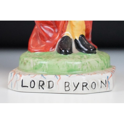 64 - 19th Century Victorian Lord Byron Staffordshire figurine, together with two carved stone bowls, a si... 