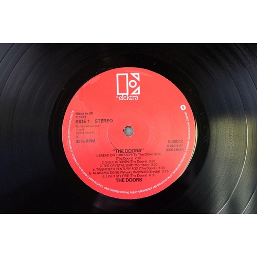 496 - Vinyl - 4 The Doors LPs to include LA Woman (K42090 German press), Self Titled (K42012), The Soft Pa... 