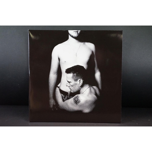 146 - Vinyl - Two recent release LPs to include U2 Songs Of Innocence (White vinyl 4704888) Ex and Jeff Ly... 