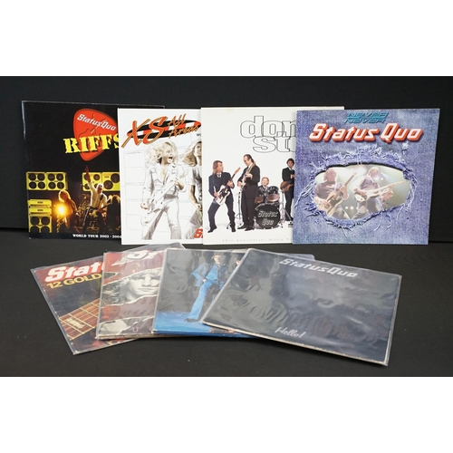 945 - Vinyl & Memorabilia - 4 Status Quo LPs and 4 Status Quo tour programmes from the 1990s / 2000s.