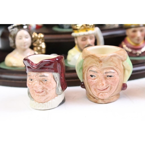 97 - Set of Six Royal Doulton 'Kings & Queens of the Realm' tiny character jugs on wooden display stand (... 