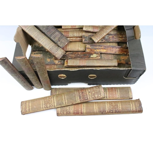 412 - Collection of assorted leather bound book spines with gilt decorative titling. Approx 32 spines in t... 