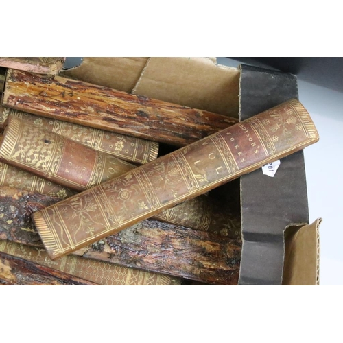 412 - Collection of assorted leather bound book spines with gilt decorative titling. Approx 32 spines in t... 