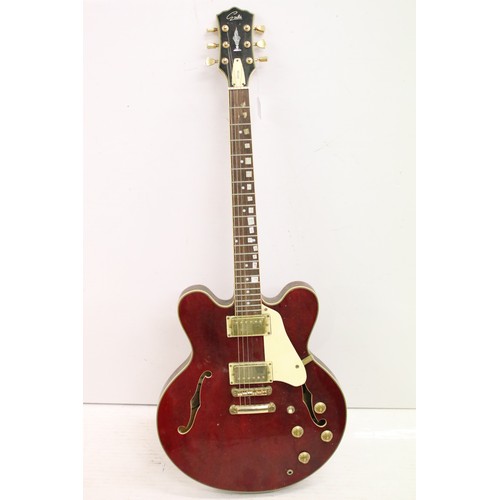 952 - Guitar - A Gould GS135 hollow body electric guitar in wine red finish