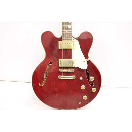 952 - Guitar - A Gould GS135 hollow body electric guitar in wine red finish