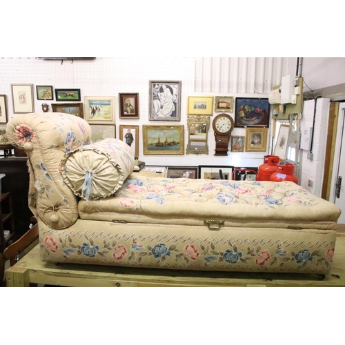 641 - Early 20th century Ottoman Daybed upholstered in cream floral fabric with bolster cushion, raised on... 