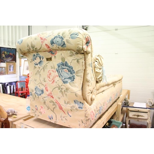 641 - Early 20th century Ottoman Daybed upholstered in cream floral fabric with bolster cushion, raised on... 