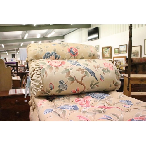 641 - Early 20th century Ottoman Daybed upholstered in cream floral fabric with bolster cushion, raised on... 