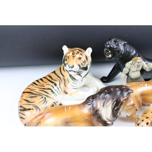 131 - Collection of ceramic big cats to include four Lomonosov lions and two Lomonosov tigers. Also includ... 