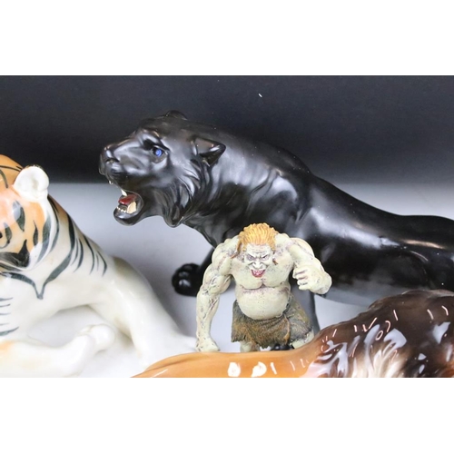 131 - Collection of ceramic big cats to include four Lomonosov lions and two Lomonosov tigers. Also includ... 