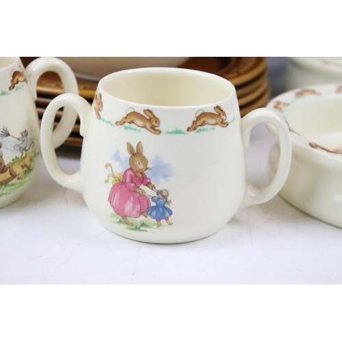 136 - Royal Doulton Bunnykins ceramics to include two twin handled cups, two baby bowl round dishes and an... 