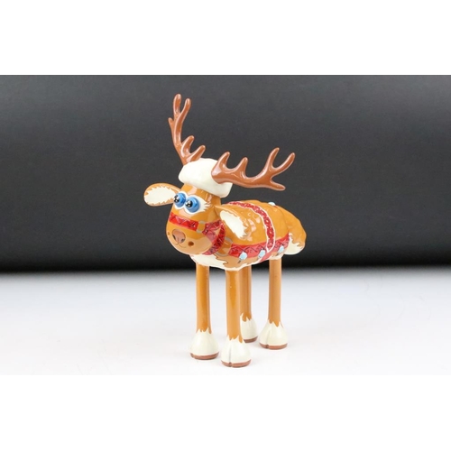 139 - Four Aardman figurines to include a Grand Appeal Shaun in the city reindeer sheep figurine in origin... 