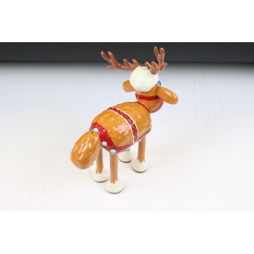 139 - Four Aardman figurines to include a Grand Appeal Shaun in the city reindeer sheep figurine in origin... 