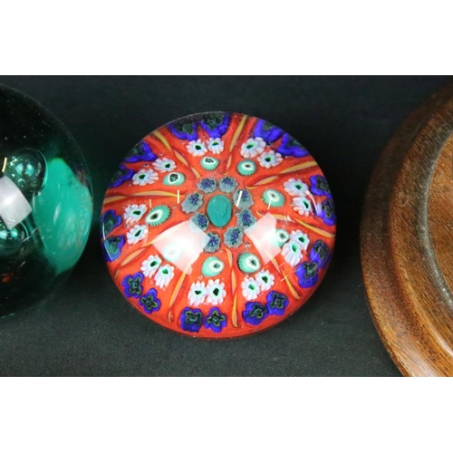 146 - Collection of paperweights to include three millefiori cane examples, a large green twist example, p... 