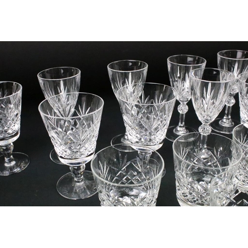 147 - Group of eighteen cut crystal glasses to include wine, tumblers, and sherry glasses. Some with Webb ... 