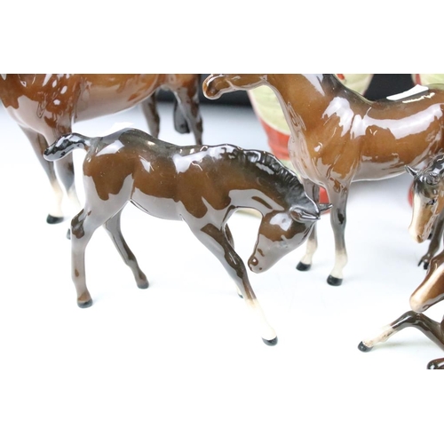 153 - Group of ceramic horses to include a three Beswick horses with 2 white feet, a Beswick recumbent hor... 