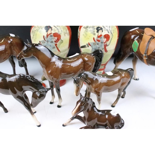 153 - Group of ceramic horses to include a three Beswick horses with 2 white feet, a Beswick recumbent hor... 