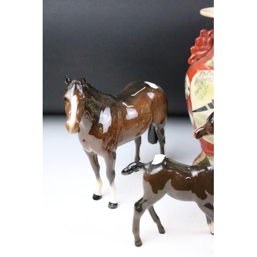 153 - Group of ceramic horses to include a three Beswick horses with 2 white feet, a Beswick recumbent hor... 