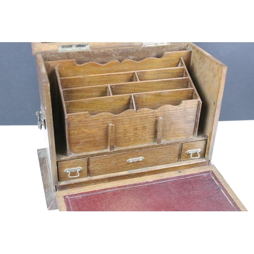 179 - Early 20th Century Edwardian oak desk tidy. The box having a fall front to revealing sectioned inter... 