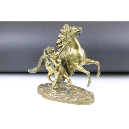 203 - After Guillaume Coustou (1677-1746) - A Pair of Bronze Marly Horses, of traditional form on shaped b... 