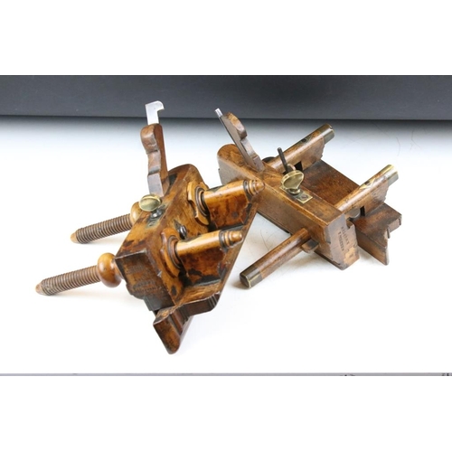 205 - Two vintage wooden planes with brass details, to include a plough plane and a screw-stem example. Wi... 