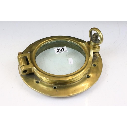 207 - Two brass portholes, the largest cover stamped John Roby Ltd (with matched base plate, approx 33cm d... 